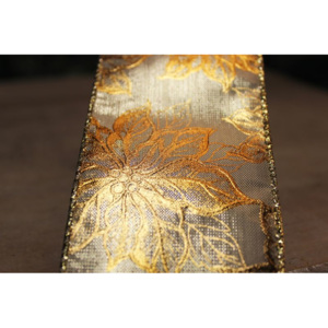Zlatá lesklá stuha s kvetinkovým vzorom