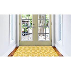 Žltý vysokoodolný a umývateľný koberec vhodný do exteriéru Interlaced, 133 × 190 cm