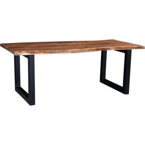 Dlhý jedálenský stôl s krásnou masívnou drevenou doskou stola