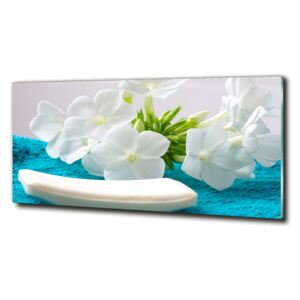 Foto obraz sklo tvrdené Biele kvety spa cz-obglass-125x50-89406381
